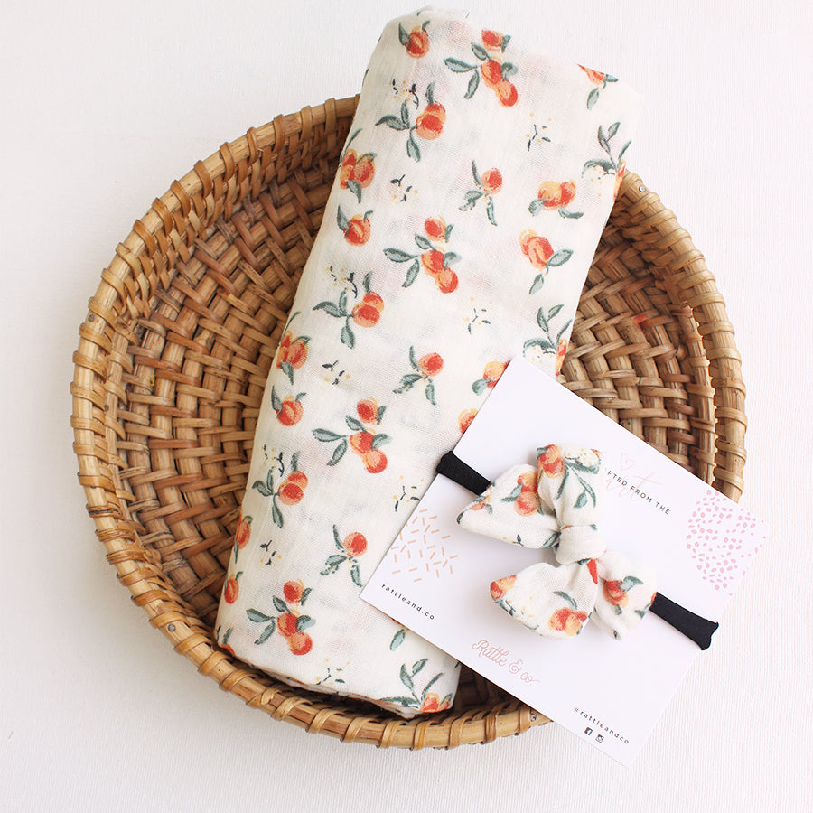Peach For The Stars - Swaddle + Bow Headband Set