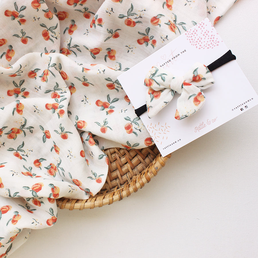 Peach For The Stars - Swaddle + Bow Headband Set