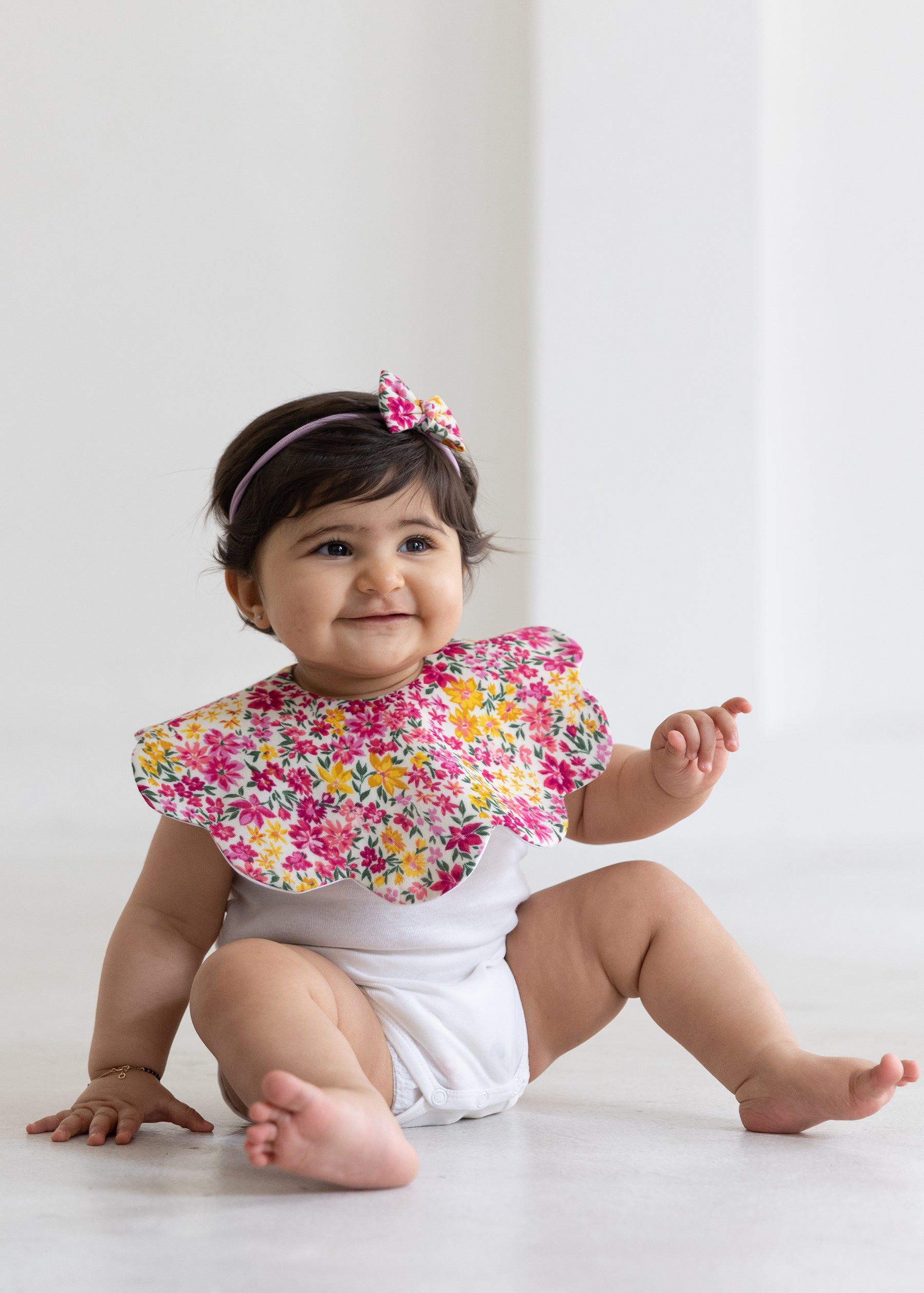 Chasing Flower Fields Scalloped Bib With Bow